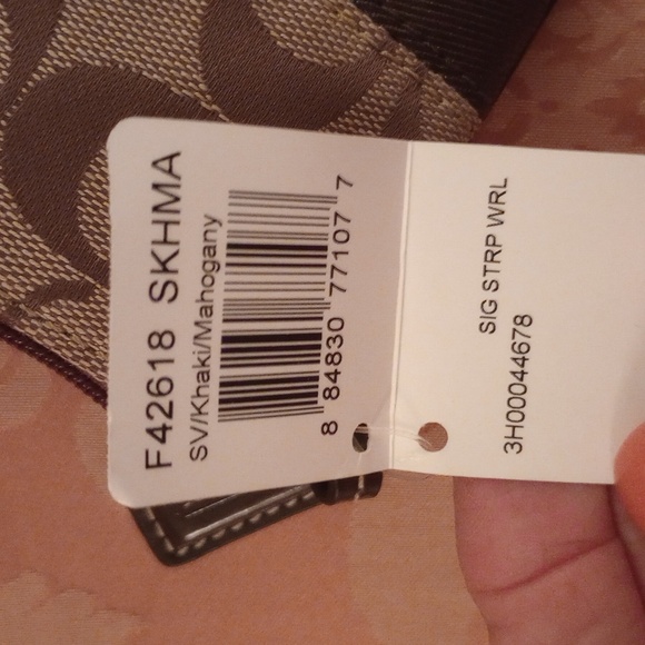 Nwt. Coach Signature C Brown and tan wristlet. - Picture 5 of 6